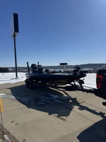 Slide: The Image of 2025 Skeeter ZXR21 boat on a lake with a person fishing. - 1