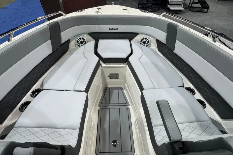 Slide: The Image of 2025 Chaparral 2870 SSX boat interior with sleek gray seating and modern design. - 15