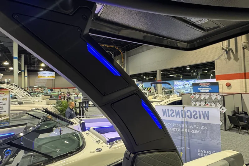 Slide: The Image of 2025 Chaparral 2870 SSX boat interior with modern seating and sleek design. - 16