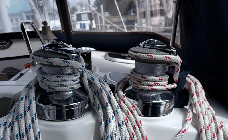 Slide: The Image of Sailboat winches with ropes on a 1998 Hunter 410 yacht deck. - 10