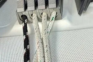 Slide: The Image of Rope clutches on a 1998 Hunter 410 sailboat, featuring multiple braided ropes. - 11