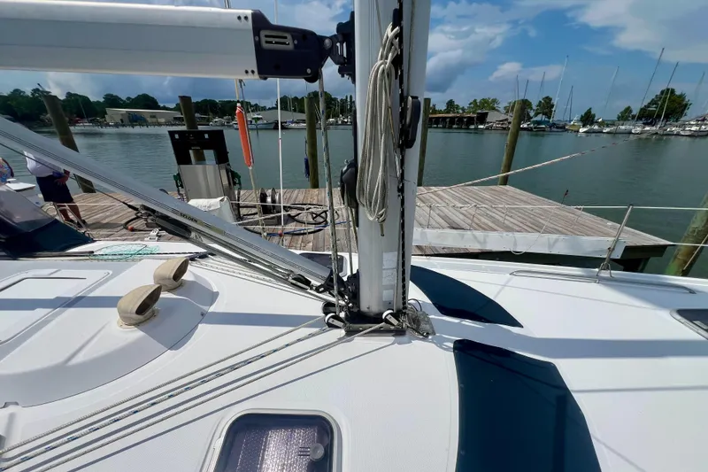 Slide: The Image of Sailboat deck view at marina, featuring Hunter 410, 1998 model. - 23