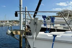 Slide: The Image of Sailboat docked at marina, Hunter 410 model, 1998, with clear blue sky. - 4