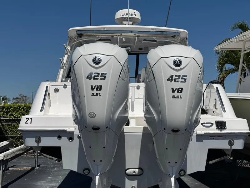 Slide: The Image of 2019 Everglades 340 Dual Console with twin Yamaha 425 V8 engines, rear view. - 11