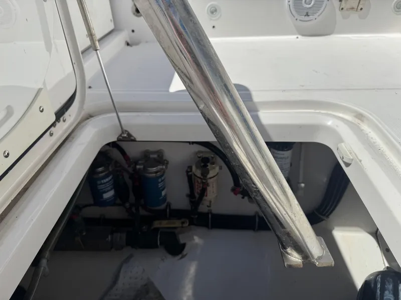 Slide: The Image of 2019 Everglades 340 Dual Console boat interior with visible components and wiring. - 46