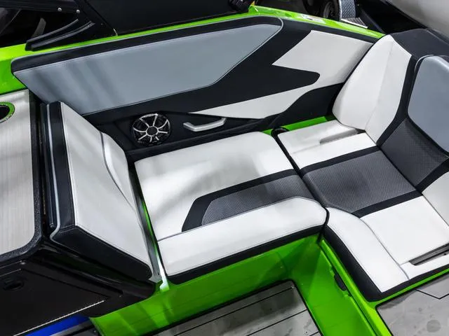 Slide: The Image of 2022 Yamaha Boats 255XD interior with modern seating and sleek design. - 13