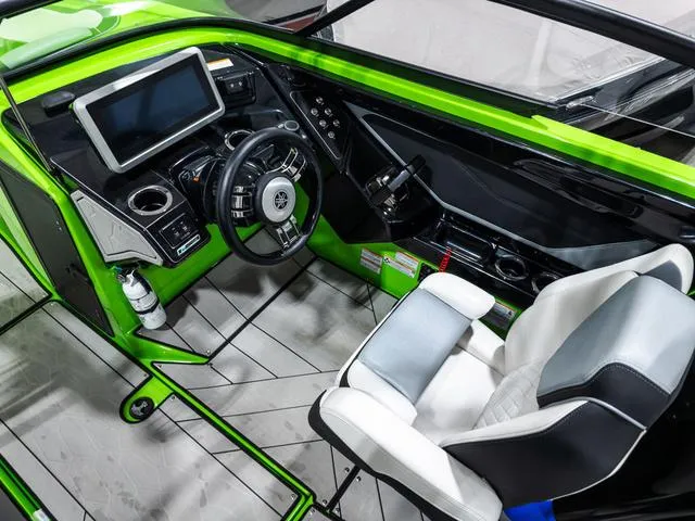 Slide: The Image of Interior of 2022 Yamaha Boats 255XD, featuring sleek design and modern controls. - 17