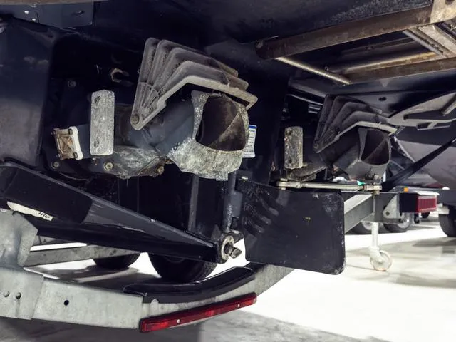 Slide: The Image of Underneath view of a 2022 Yamaha Boats 255XD, showcasing the dual jet propulsion system. - 30