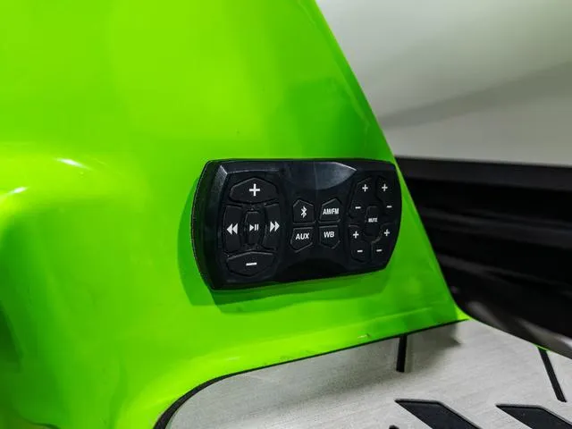 Slide: The Image of Control panel on 2022 Yamaha Boats 255XD, featuring audio and navigation buttons. - 7