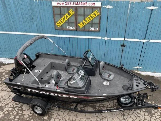 Slide: The Image of 2025 Tracker Pro Guide V-175 WT fishing boat on trailer, displayed at Sizzle Marine, Ohio. - 6