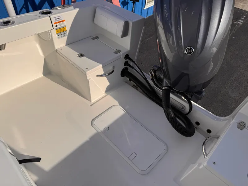 Slide: The Image of 2025 Parker 21 Special Edition boat interior with Yamaha outboard motor. - 12