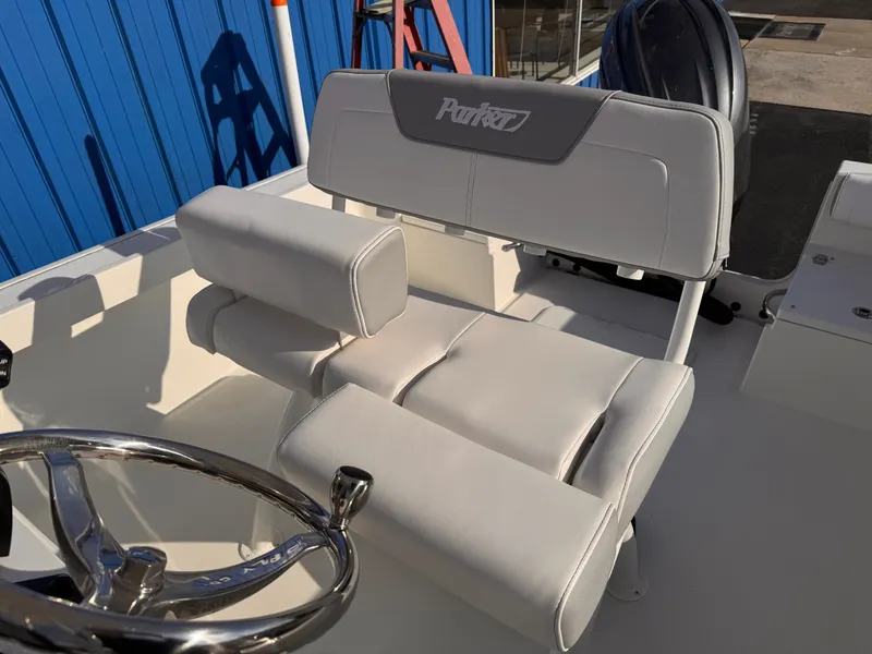 Slide: The Image of Parker 21 Special Edition 2025 boat seat with steering wheel, featuring white upholstery. - 15