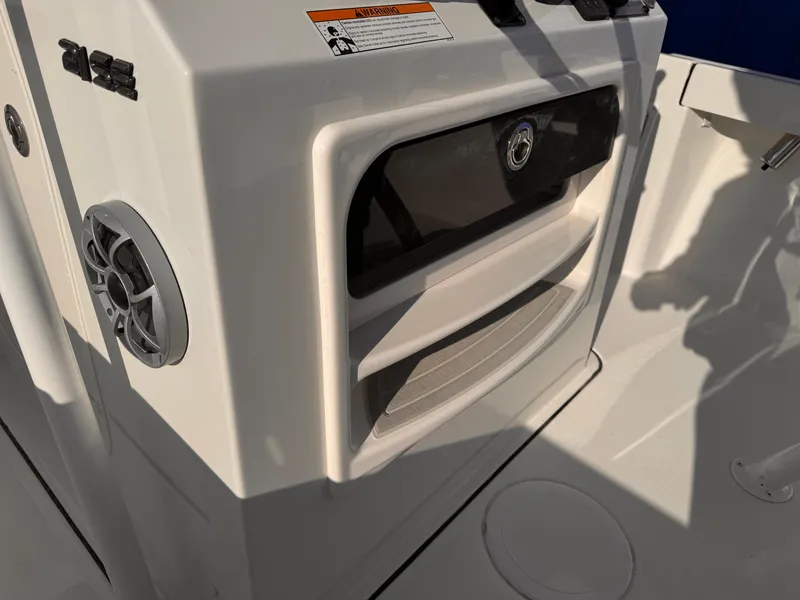 Slide: The Image of Parker 21 Special Edition 2025 boat interior with speaker and storage compartments. - 17