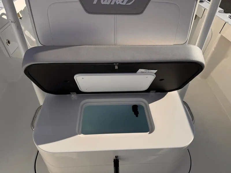 Slide: The Image of Parker 21 Special Edition 2025 boat seat with storage compartment open. - 20