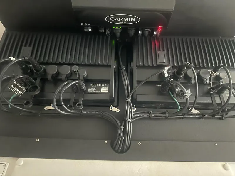 Slide: The Image of 2023 Contender 35 ST electronics setup with Garmin marine equipment. - 23