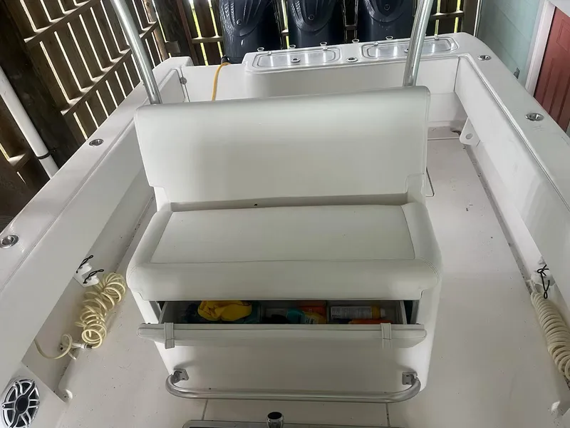 Slide: The Image of 2023 Contender 35 ST boat interior with storage compartment open. - 27