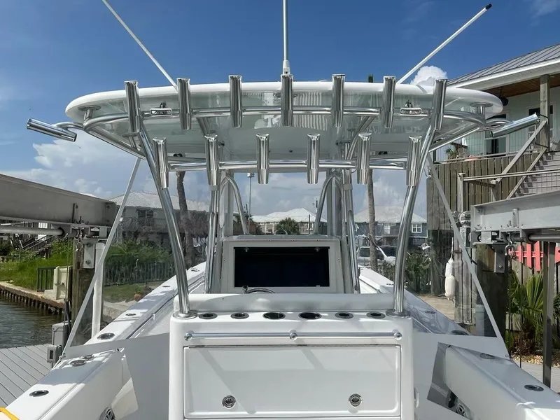 Slide: The Image of 2023 Contender 35 ST boat with sleek design and advanced fishing equipment. - 37