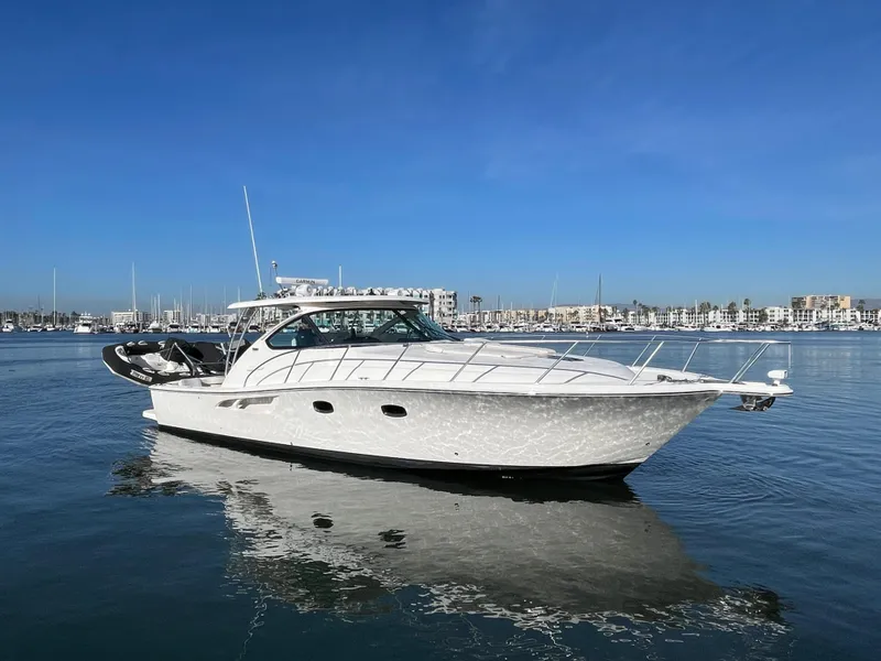 Slide: The Image of 2013 Tiara Yachts 3900 Open on calm water, clear sky background. - 1