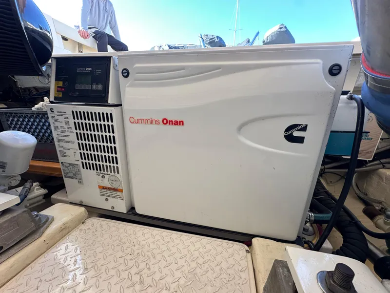 Slide: The Image of Cummins Onan generator in a 2013 Tiara Yachts 3900 Open engine room. - 22