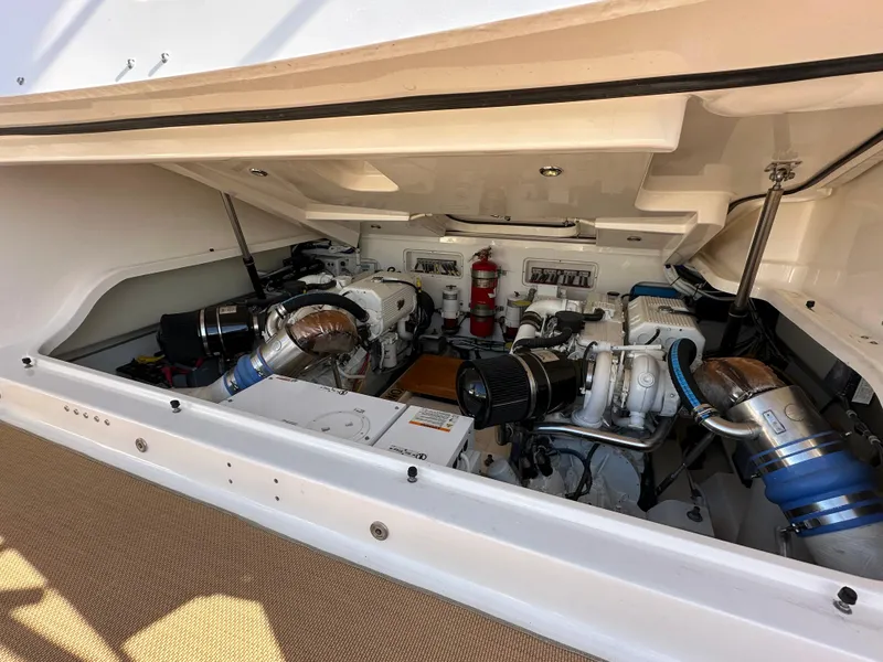 Slide: The Image of Engine compartment of 2013 Tiara Yachts 3900 Open, showcasing mechanical components. - 26