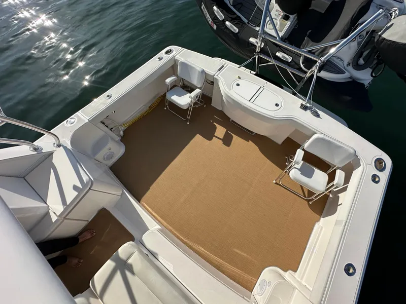 Slide: The Image of 2013 Tiara Yachts 3900 Open deck with seating, overlooking water. - 38