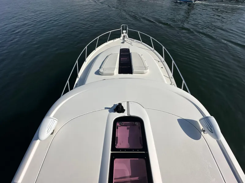 Slide: The Image of 2013 Tiara Yachts 3900 Open, aerial view of the bow on calm water. - 39