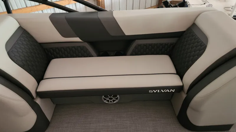 Slide: The Image of Sylvan L3 2026: Sleek gray and black upholstery with textured details and a speaker. - 24