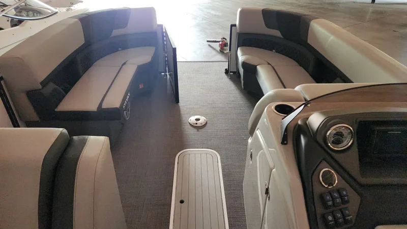 Slide: The Image of Interior of a 2026 Sylvan L3 with gray and black seating. - 30
