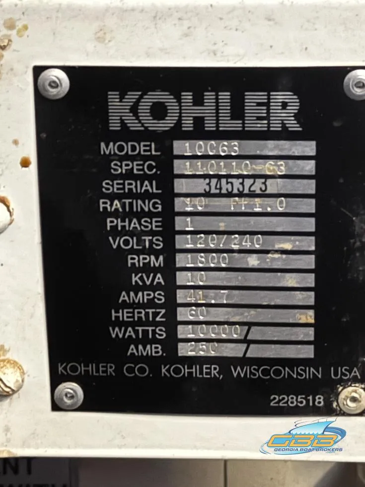 Slide: The Image of Kohler generator specifications plate on a 1995 Carver 430 Cockpit Motor Yacht. - 44