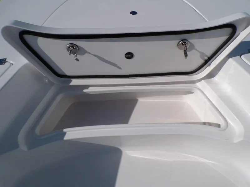 Slide: The Image of Storage compartment of 2025 Tidewater 2410 BM boat, open and empty. - 15