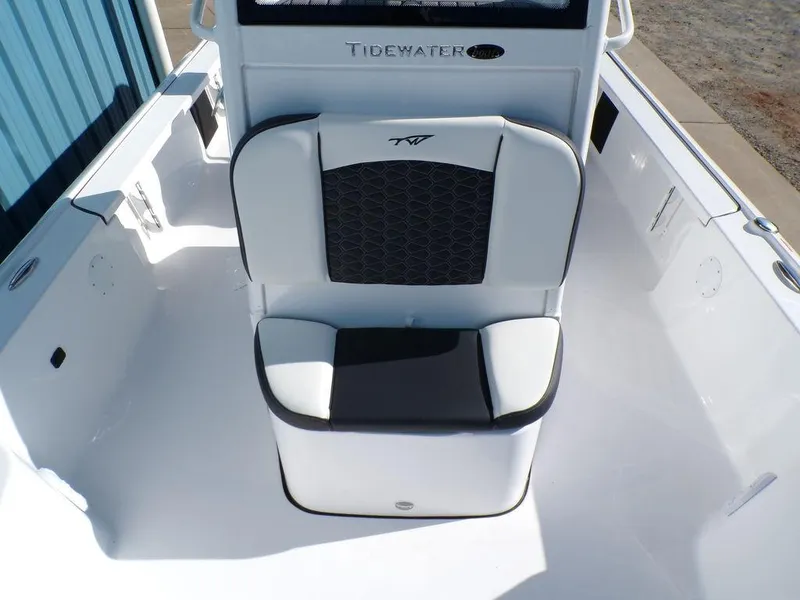 Slide: The Image of 2025 Tidewater 2410 BM boat seat with black and white upholstery. - 19