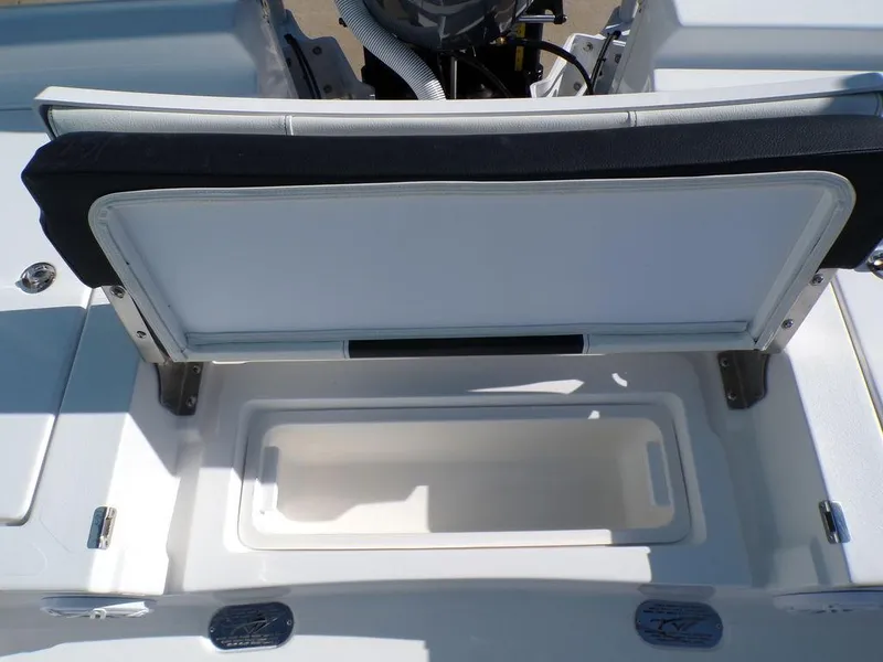 Slide: The Image of 2025 Tidewater 2410 BM boat interior with open storage compartment. - 26