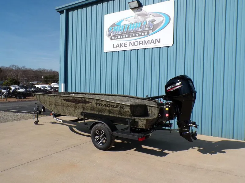 Slide: The Image of 2025 Tracker Grizzly® 1650 T Prairie Wings Edition boat at Lake Norman dealership. - 4