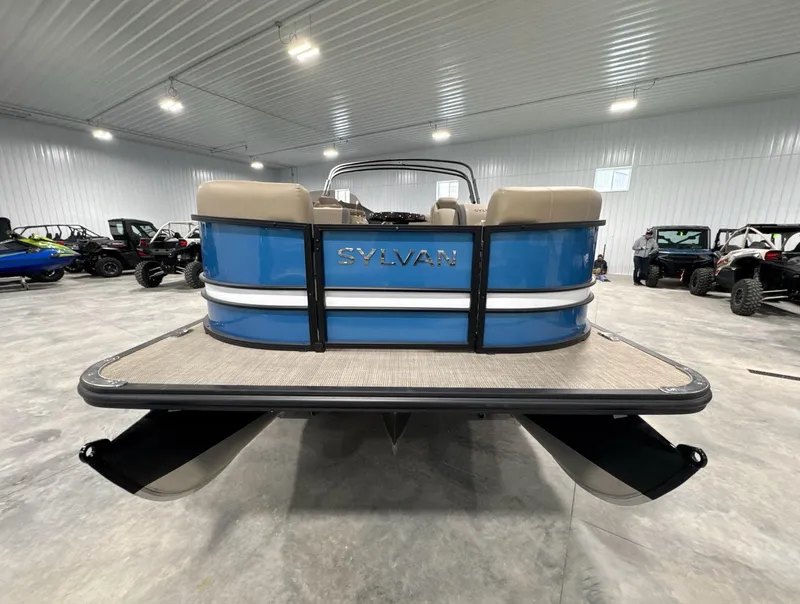 Slide: The Image of 2024 Sylvan Mirage X X3 CLZ DH pontoon boat in a showroom setting. - 9