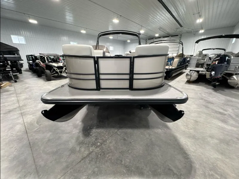 Slide: The Image of 2024 Sylvan Mirage 820 LZ pontoon boat in showroom, rear view. - 3