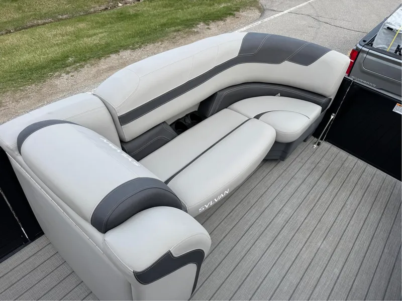Slide: The Image of 2023 Sylvan L5 DLZ Bar pontoon boat with stylish gray seating. - 5