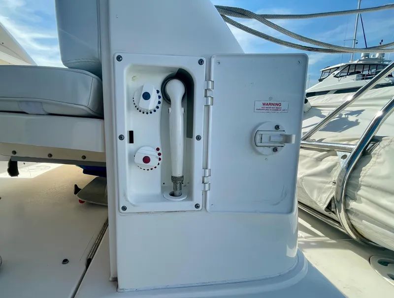 Slide: The Image of 2001 Sea Ray 340 Sundancer boat shower controls and compartment. - 42