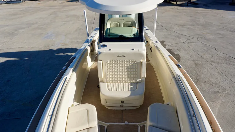 Slide: The Image of 2021 Chris-Craft Catalina 27 boat interior, featuring spacious seating and elegant design. - 11