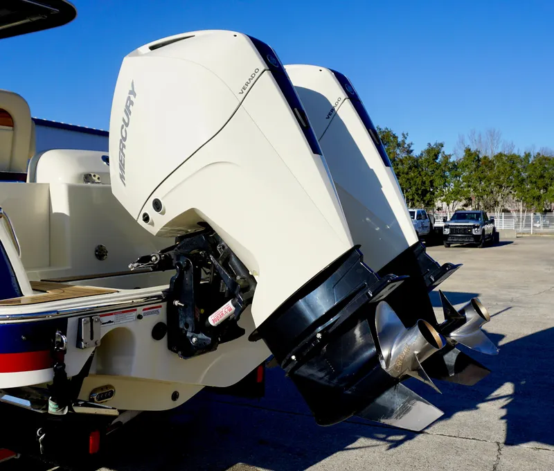 Slide: The Image of 2021 Chris-Craft Catalina 27 with twin Mercury outboard engines. - 7