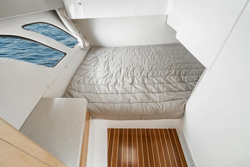 Slide: The Image of Interior cabin of 2010 Intrepid 43 Sport Yacht with bed and ocean view. - 37