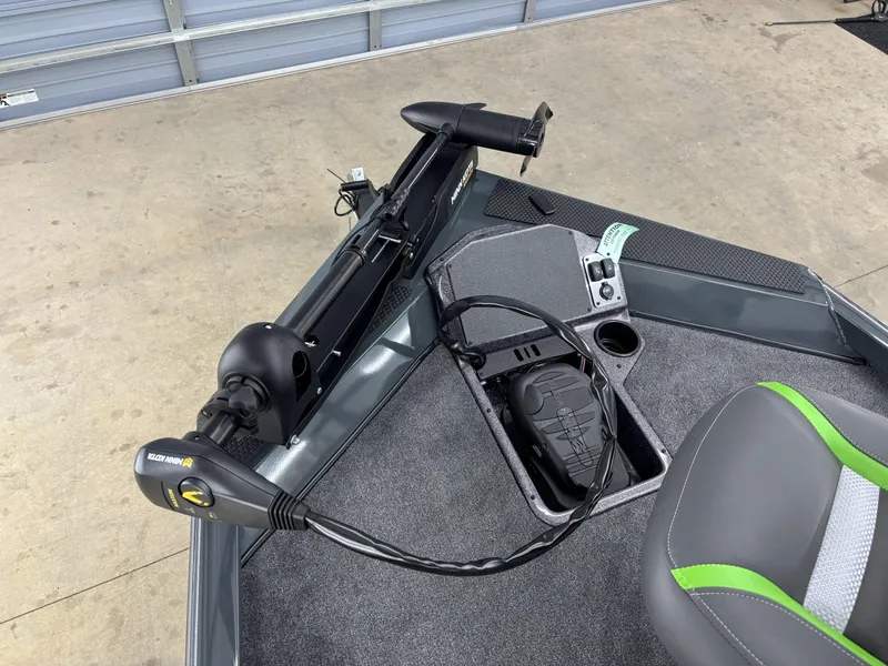 Slide: The Image of 2025 Ranger RT198P boat interior with trolling motor and seating. - 13