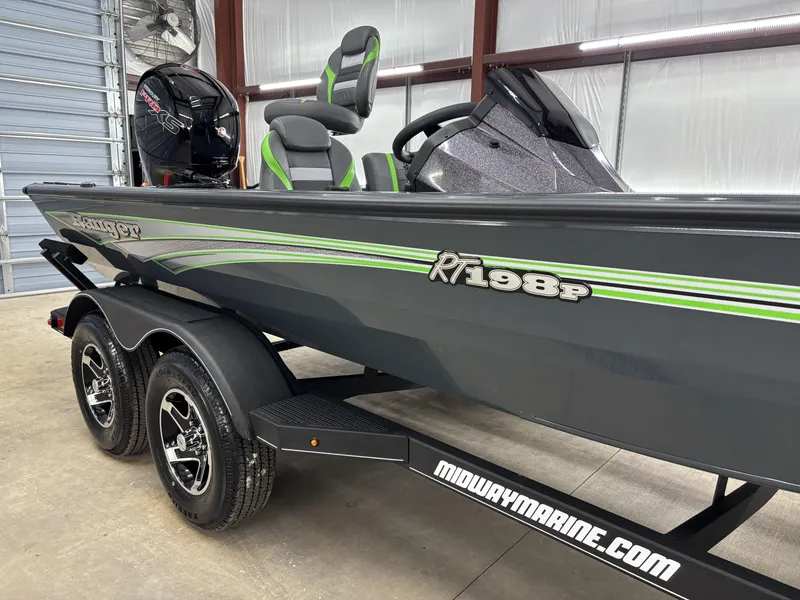 Slide: The Image of 2025 Ranger RT198P boat on trailer in garage, featuring sleek design and modern seating. - 5