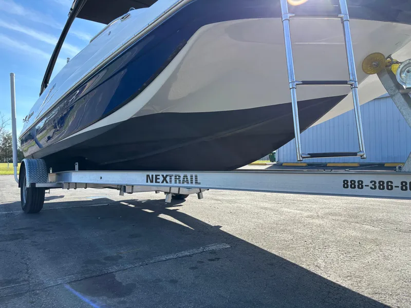 Slide: The Image of 2021 Hurricane SS 201 boat on Nextrail trailer, parked outdoors. - 10