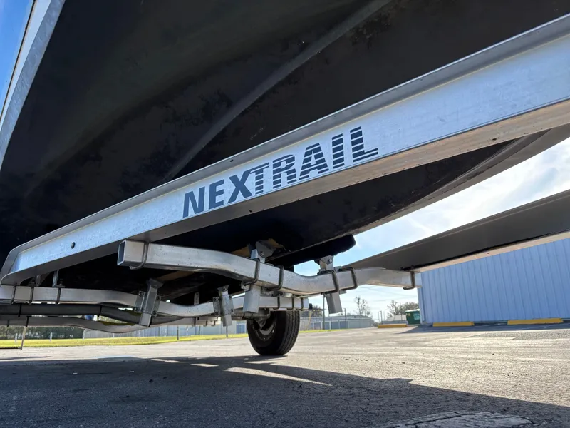 Slide: The Image of Underneath view of a 2021 Hurricane SS 201 boat on a Nextrail trailer. - 11