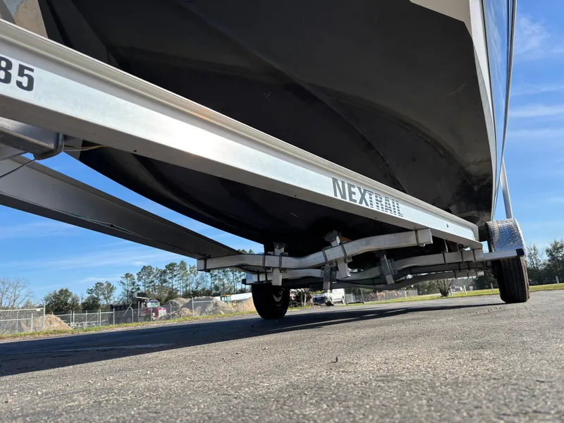 Slide: The Image of 2021 Hurricane SS 201 boat on trailer, viewed from ground level. - 12