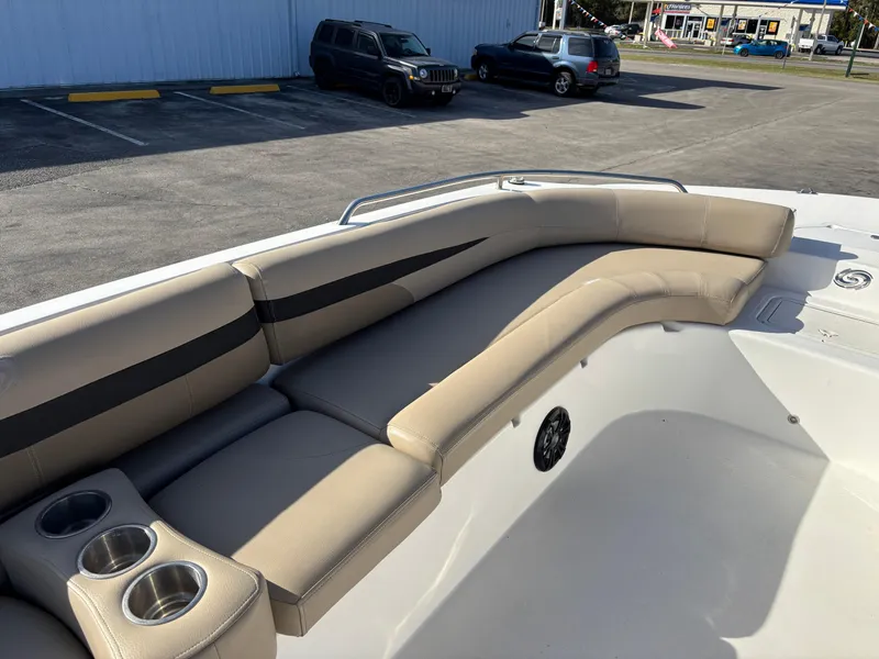 Slide: The Image of 2021 Hurricane SS 201 boat interior with beige seating and cup holders. - 22