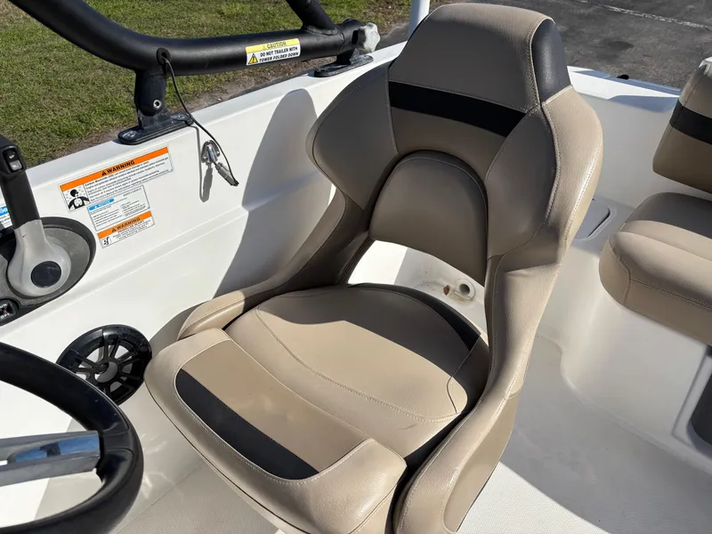 Slide: The Image of 2021 Hurricane SS 201 boat seat with beige and black upholstery. - 24
