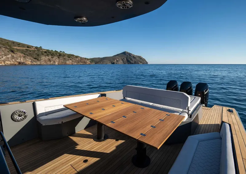 Slide: The Image of Luxury Maxim Yachts MAX44R 2025 model, featuring elegant deck seating and scenic ocean view. - 12