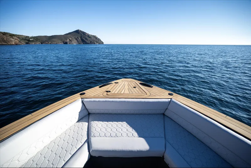 Slide: The Image of Luxury Maxim Yachts MAX44R 2025 cruising on serene ocean waters. - 17