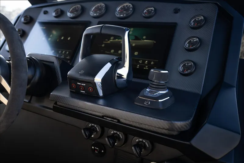 Slide: The Image of Control panel of 2025 Maxim Yachts MAX44R, featuring advanced navigation instruments. - 5